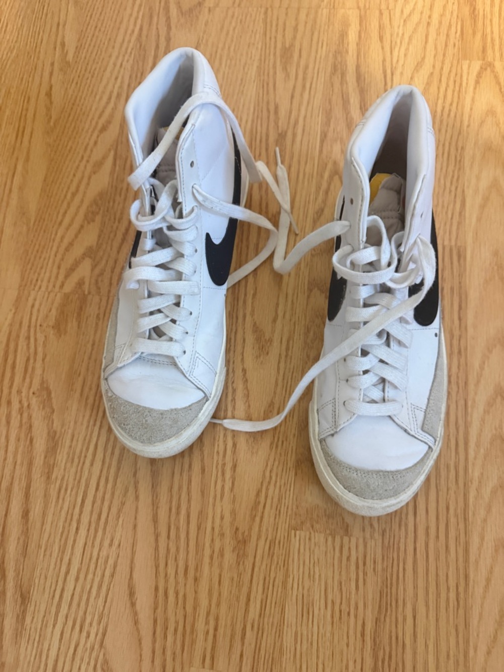 Nike blazer White High-Top Sneakers with Black Swoosh Accents